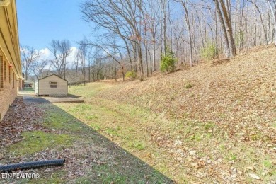 Appealing brick rancher with many new updates located in on Emory Golf and Country Club in Tennessee - for sale on GolfHomes.com, golf home, golf lot