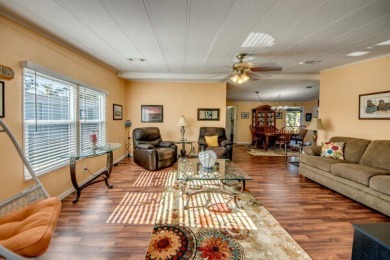 Welcome to this spacious three-bedroom, three-bath home in the on Lake Fairways Country Club in Florida - for sale on GolfHomes.com, golf home, golf lot