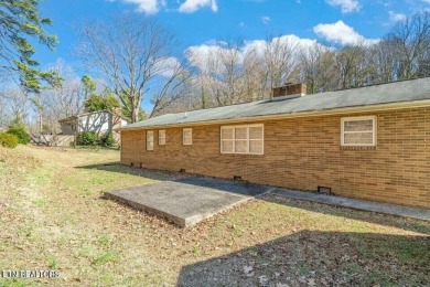 Appealing brick rancher with many new updates located in on Emory Golf and Country Club in Tennessee - for sale on GolfHomes.com, golf home, golf lot