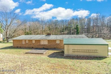 Appealing brick rancher with many new updates located in on Emory Golf and Country Club in Tennessee - for sale on GolfHomes.com, golf home, golf lot