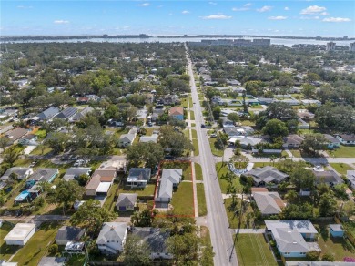 Welcome home to 1714 58th St S in Gulfport, FL.  This amazing on Pasadena Yacht and Country Club in Florida - for sale on GolfHomes.com, golf home, golf lot