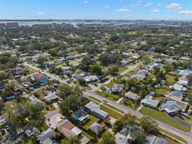 Welcome home to 1714 58th St S in Gulfport, FL.  This amazing on Pasadena Yacht and Country Club in Florida - for sale on GolfHomes.com, golf home, golf lot