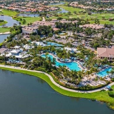 Golf course views fill this charming 2-story home of 4 bedrooms on Woodfield Country Club in Florida - for sale on GolfHomes.com, golf home, golf lot