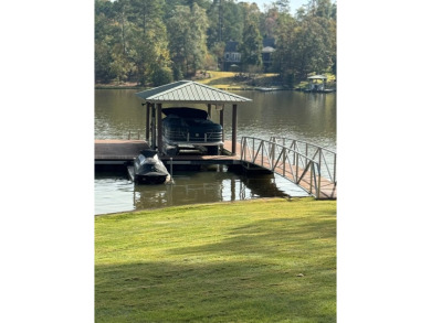 OUTSTANDING ARCHITECTURAL MASTERPIECE IN THE PLANTATION - THE on The Patriot Golf Club At Grand Harbor in South Carolina - for sale on GolfHomes.com, golf home, golf lot