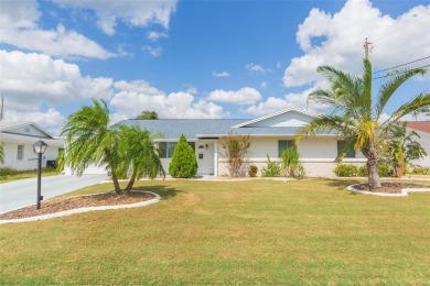 Step into this beautifully updated 3-bedroom, 2-bathroom home on North Lakes Golf Course in Florida - for sale on GolfHomes.com, golf home, golf lot