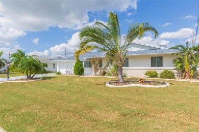 Step into this beautifully updated 3-bedroom, 2-bathroom home on North Lakes Golf Course in Florida - for sale on GolfHomes.com, golf home, golf lot