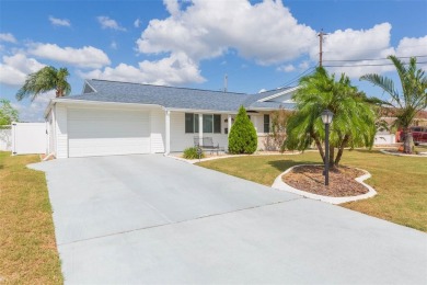 Step into this beautifully updated 3-bedroom, 2-bathroom home on North Lakes Golf Course in Florida - for sale on GolfHomes.com, golf home, golf lot