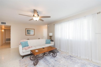 Step into this beautifully updated 3-bedroom, 2-bathroom home on North Lakes Golf Course in Florida - for sale on GolfHomes.com, golf home, golf lot