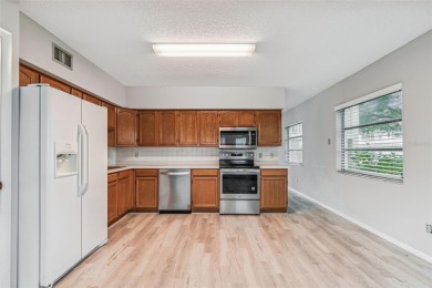 You will be On Top of the World in this updated two bedroom two on On Top Of The World Golf Course in Florida - for sale on GolfHomes.com, golf home, golf lot