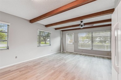 You will be On Top of the World in this updated two bedroom two on On Top Of The World Golf Course in Florida - for sale on GolfHomes.com, golf home, golf lot