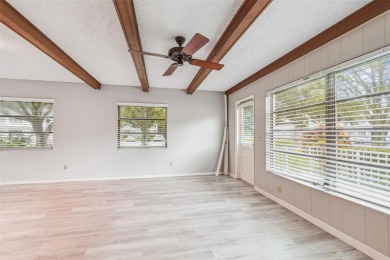 You will be On Top of the World in this updated two bedroom two on On Top Of The World Golf Course in Florida - for sale on GolfHomes.com, golf home, golf lot