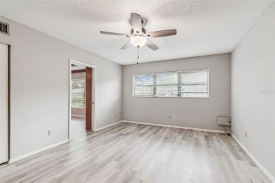 You will be On Top of the World in this updated two bedroom two on On Top Of The World Golf Course in Florida - for sale on GolfHomes.com, golf home, golf lot