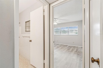 You will be On Top of the World in this updated two bedroom two on On Top Of The World Golf Course in Florida - for sale on GolfHomes.com, golf home, golf lot