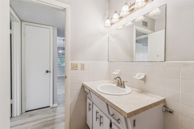 You will be On Top of the World in this updated two bedroom two on On Top Of The World Golf Course in Florida - for sale on GolfHomes.com, golf home, golf lot