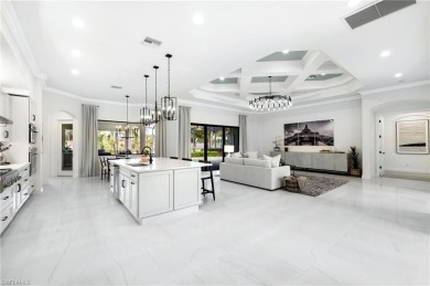 Newly updated! Experience modern elegance in this 3128 sq ft on Shadow Wood Preserve in Florida - for sale on GolfHomes.com, golf home, golf lot