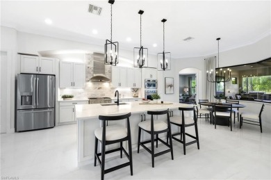 Newly updated! Experience modern elegance in this 3128 sq ft on Shadow Wood Preserve in Florida - for sale on GolfHomes.com, golf home, golf lot