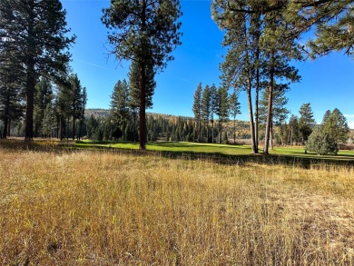 Golfers! This sprawling, level 1 acre building site is located on Double Arrow Lodge in Montana - for sale on GolfHomes.com, golf home, golf lot