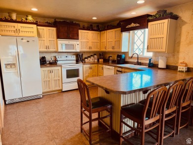 Fine craftsmanship, beautifully maintained full-time residence on Bear Lake Golf Course in Utah - for sale on GolfHomes.com, golf home, golf lot