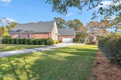 Welcome a stunning 3,185 sq ft custom-built, brick home on a on Olde Point Golf and Country Club in North Carolina - for sale on GolfHomes.com, golf home, golf lot