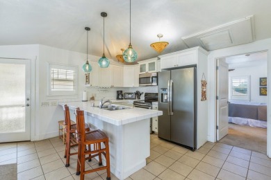 This beautifully decorated 'Hawaiiana-style' 3BR/3BA upstairs on Makai Golf Club At Princeville in Hawaii - for sale on GolfHomes.com, golf home, golf lot