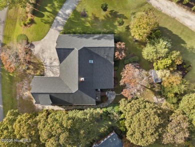 Welcome a stunning 3,185 sq ft custom-built, brick home on a on Olde Point Golf and Country Club in North Carolina - for sale on GolfHomes.com, golf home, golf lot