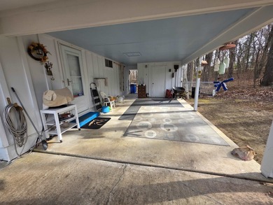 This is a must-see home with 3 bedrooms and 1 and a 1/2 baths on Cherokee Village North Course in Arkansas - for sale on GolfHomes.com, golf home, golf lot