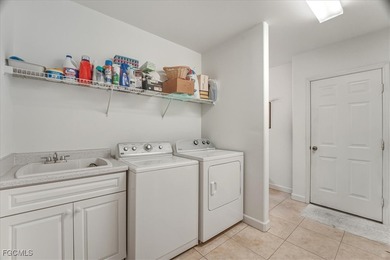 Welcome to 9346 Spanish Moss Way, Bonita Springs, FL 34135 on Spanish Wells Golf and Country Club in Florida - for sale on GolfHomes.com, golf home, golf lot