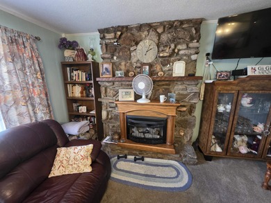 This is a must-see home with 3 bedrooms and 1 and a 1/2 baths on Cherokee Village North Course in Arkansas - for sale on GolfHomes.com, golf home, golf lot