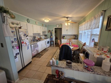 This is a must-see home with 3 bedrooms and 1 and a 1/2 baths on Cherokee Village North Course in Arkansas - for sale on GolfHomes.com, golf home, golf lot