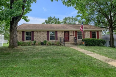 Welcome to this stunning brick ranch perfectly positioned on on Tates Creek Golf Course in Kentucky - for sale on GolfHomes.com, golf home, golf lot