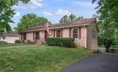 Welcome to this stunning brick ranch perfectly positioned on on Tates Creek Golf Course in Kentucky - for sale on GolfHomes.com, golf home, golf lot