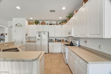 Welcome to 9346 Spanish Moss Way, Bonita Springs, FL 34135 on Spanish Wells Golf and Country Club in Florida - for sale on GolfHomes.com, golf home, golf lot