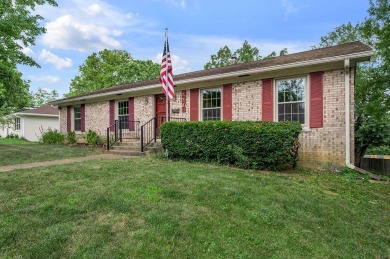 Welcome to this stunning brick ranch perfectly positioned on on Tates Creek Golf Course in Kentucky - for sale on GolfHomes.com, golf home, golf lot