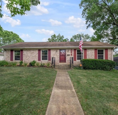 Welcome to this stunning brick ranch perfectly positioned on on Tates Creek Golf Course in Kentucky - for sale on GolfHomes.com, golf home, golf lot