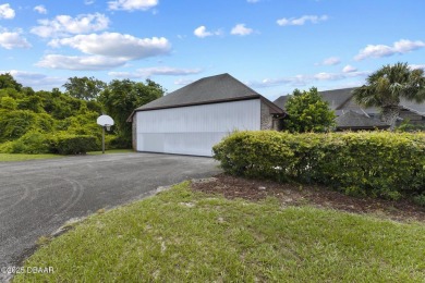 RARE AND DESIRABLE HANGAR HOME OFFERING IN THE EXCLUSIVE SPRUCE on Spruce Creek Golf Club in Florida - for sale on GolfHomes.com, golf home, golf lot