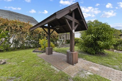 RARE AND DESIRABLE HANGAR HOME OFFERING IN THE EXCLUSIVE SPRUCE on Spruce Creek Golf Club in Florida - for sale on GolfHomes.com, golf home, golf lot