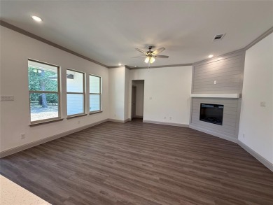 This 4-bedroom, 3-bath home sits on over half an acre on a quiet on Lake Kiowa Golf Course in Texas - for sale on GolfHomes.com, golf home, golf lot