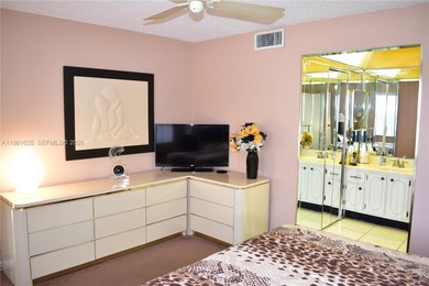 Truly spectacular views are what differentiate this unit from on Sunrise Lakes Phase III in Florida - for sale on GolfHomes.com, golf home, golf lot