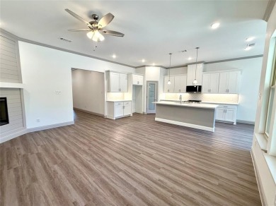 This 4-bedroom, 3-bath home sits on over half an acre on a quiet on Lake Kiowa Golf Course in Texas - for sale on GolfHomes.com, golf home, golf lot