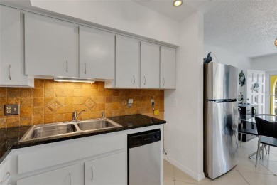 This charming move-in-ready first-floor unit features 1 bed, 1 on On Top Of The World Golf Course in Florida - for sale on GolfHomes.com, golf home, golf lot