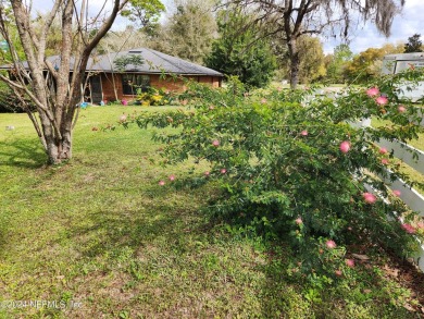 Sturdy brick ranch home with side entry garage.  Located on on Keystone Heights Golf and Country Club in Florida - for sale on GolfHomes.com, golf home, golf lot