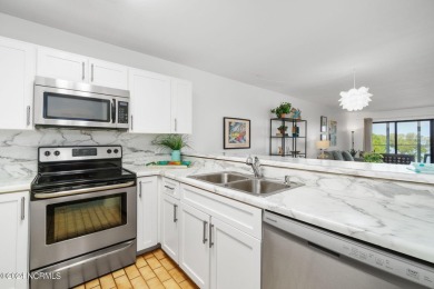 This 2-bedroom, 2-bath, second floor furnished condo in the on The Country Club of the Crystal Coast in North Carolina - for sale on GolfHomes.com, golf home, golf lot