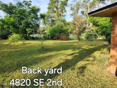 Sturdy brick ranch home with side entry garage.  Located on on Keystone Heights Golf and Country Club in Florida - for sale on GolfHomes.com, golf home, golf lot