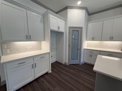 This 4-bedroom, 3-bath home sits on over half an acre on a quiet on Lake Kiowa Golf Course in Texas - for sale on GolfHomes.com, golf home, golf lot