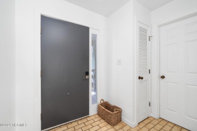 This 2-bedroom, 2-bath, second floor furnished condo in the on The Country Club of the Crystal Coast in North Carolina - for sale on GolfHomes.com, golf home, golf lot