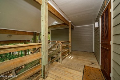 This 2-bedroom, 2-bath, second floor furnished condo in the on The Country Club of the Crystal Coast in North Carolina - for sale on GolfHomes.com, golf home, golf lot