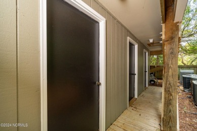 This 2-bedroom, 2-bath, second floor furnished condo in the on The Country Club of the Crystal Coast in North Carolina - for sale on GolfHomes.com, golf home, golf lot