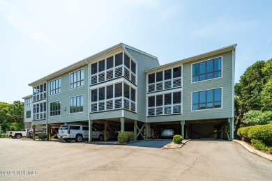 This 2-bedroom, 2-bath, second floor furnished condo in the on The Country Club of the Crystal Coast in North Carolina - for sale on GolfHomes.com, golf home, golf lot