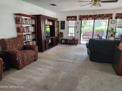 Sturdy brick ranch home with side entry garage.  Located on on Keystone Heights Golf and Country Club in Florida - for sale on GolfHomes.com, golf home, golf lot