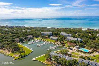 This 2-bedroom, 2-bath, second floor furnished condo in the on The Country Club of the Crystal Coast in North Carolina - for sale on GolfHomes.com, golf home, golf lot